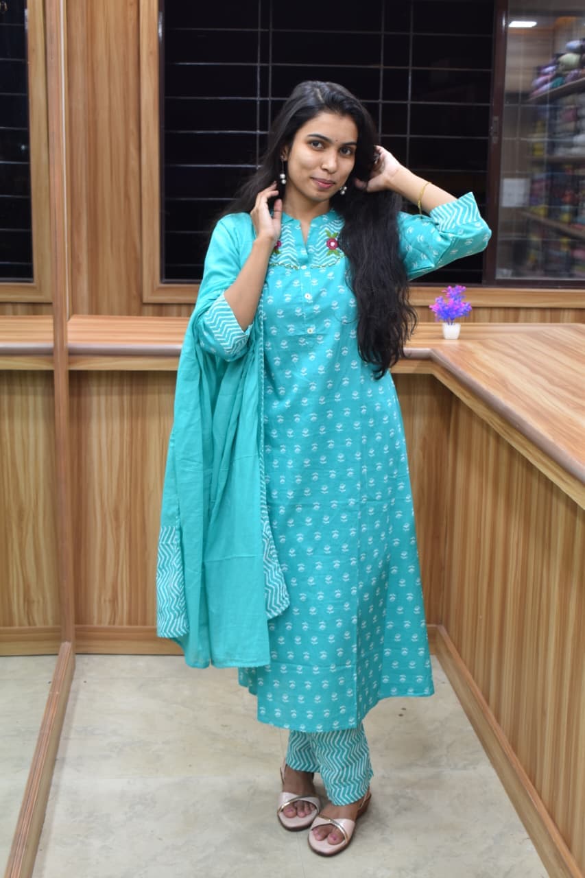 Turquoise Blue Floral Printed Kurta Set with Chevron Pants.
