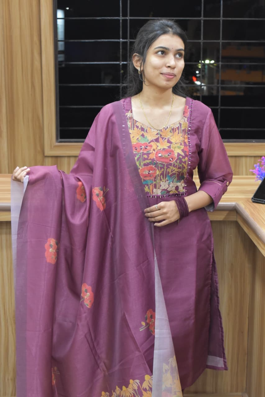 Wine Solid Flared Kurta with Embroidered Yoke and Matching Dupatta.